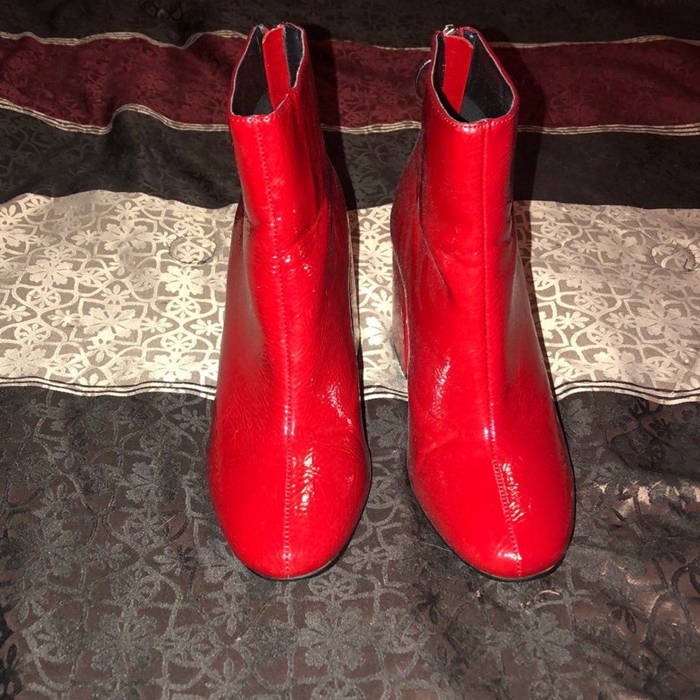 Red heel boots.